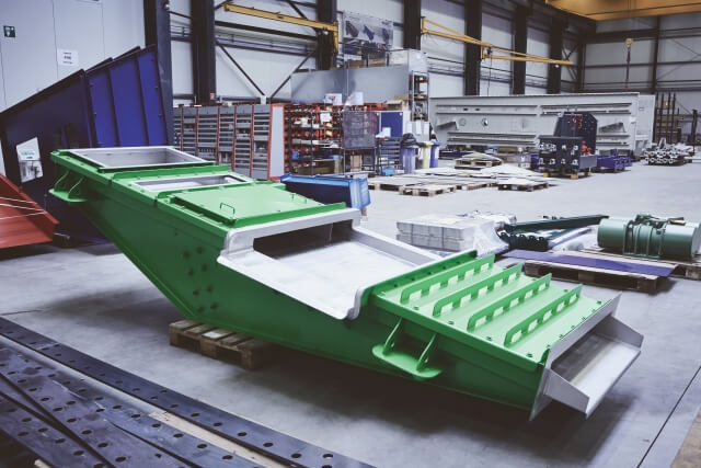 Triltransporteur van SPALECK in een gedeeltelijk afgedekte uitvoering voor het gebruik van een bovenbandmagneet
