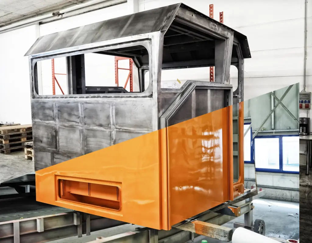 Metalen constructie met gedeeltelijke OPPERVLAKTEBEHANDELING in een werkplaats.